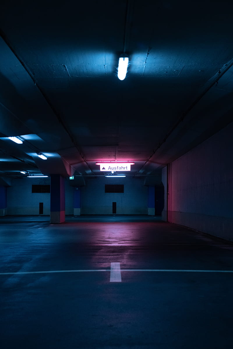 Premium AI Image  Neon Night Lights In City Garage parking