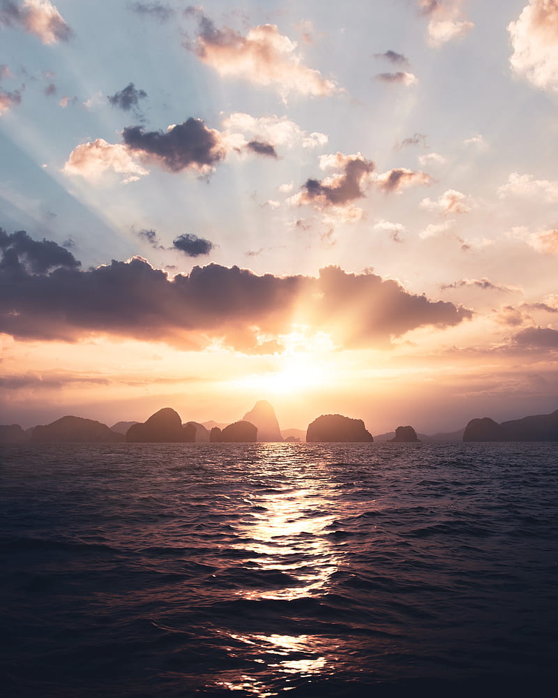 sea, rays, sun, rocks, sunset, HD phone wallpaper