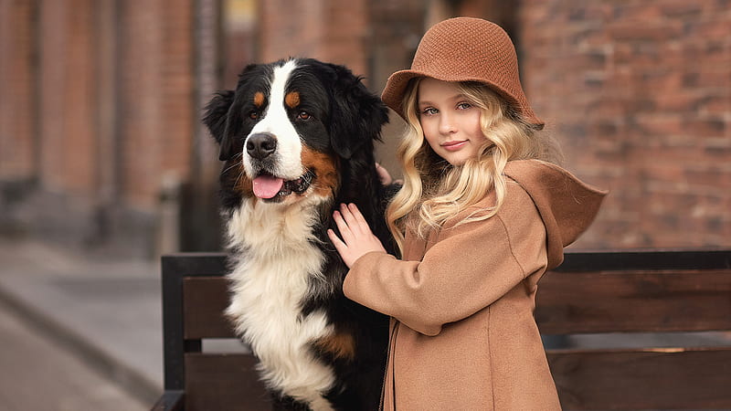 Cute Little Girl Is Standing Near Big Dog In Blur Wall Background Wearing Brown Coat And Hat Cute, HD wallpaper