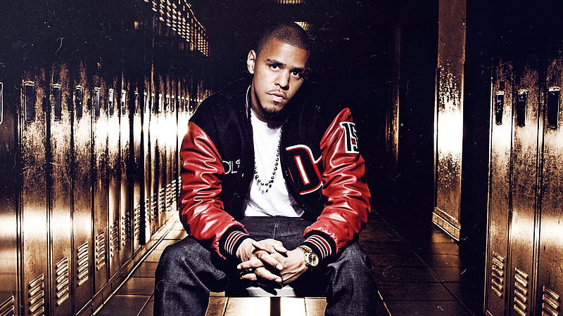 J Cole Is Sitting On Chair Wearing White T-shirt And Red Black Overcoat Music, HD wallpaper