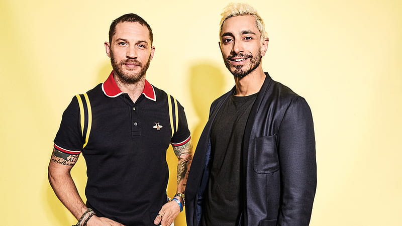 Riz Ahmed Tom Hardy Are Standing In Yellow Wall Background Wearing Black Dress Boys, HD wallpaper