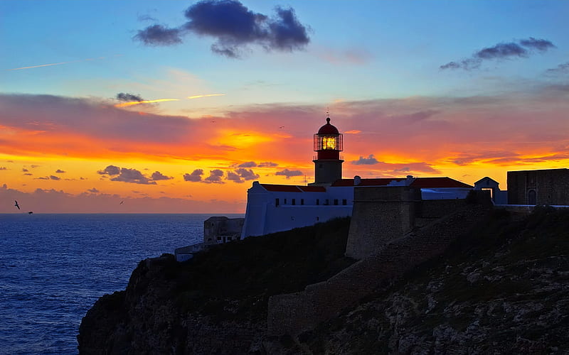 Lighthouse Sunset, skies, ocean, nature, sunrise, sunset, lighthouse, HD wallpaper