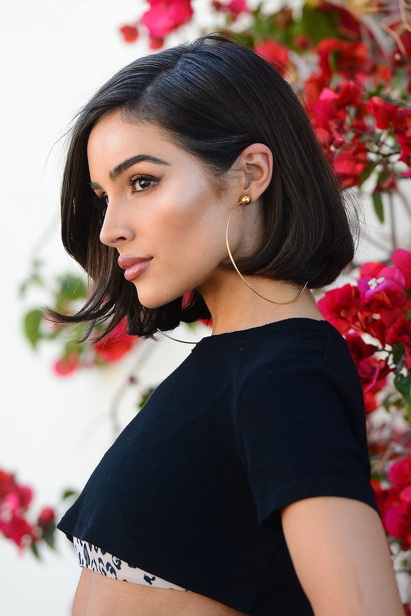 Portrait Of A Pretty Young Woman With Short Hair And Earrings Stock Photo  Picture and Royalty Free Image Image 29042626