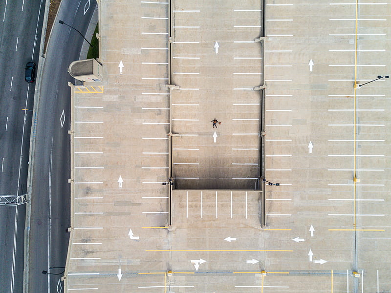 person lying on gray concrete parking area in aerial graphy, HD wallpaper