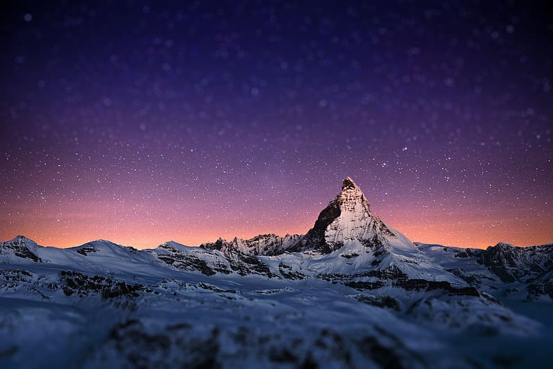 Matterhorn mountain in the alps, covered with snow and glimmering underneath a starry sky, winter, galaxies, galaxy, night sky, cold, italy, stars, matterhorn, snow, sky, mountains, switzerland, alps, HD wallpaper