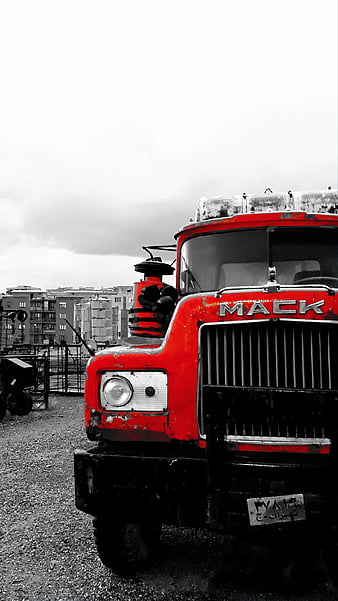 An old truck parked in a yard next to a house photo  Free Bumper Image on  Unsplash