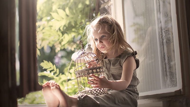 Cute Little Girl Is Sitting Near Window With Bird And Cage On Lap Wearing Grey Color Dress Cute, HD wallpaper