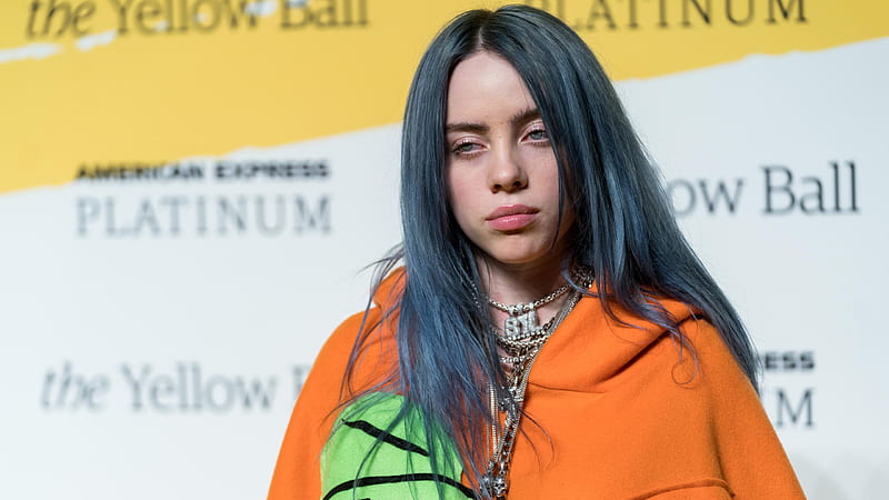 Billie Eilish Is Wearing Orange Dress And Chains On Neck Looking Down With Ash Eyes In Wording Background Celebrities, HD wallpaper