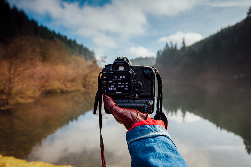person holding camera facing a river, HD wallpaper