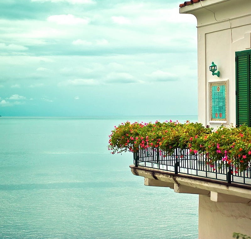 Floral balcony, roof, house, green door, balcony, ocean, clouds, floral, door, sea, nice, water, railing, flowers, petals, white, blue, HD wallpaper