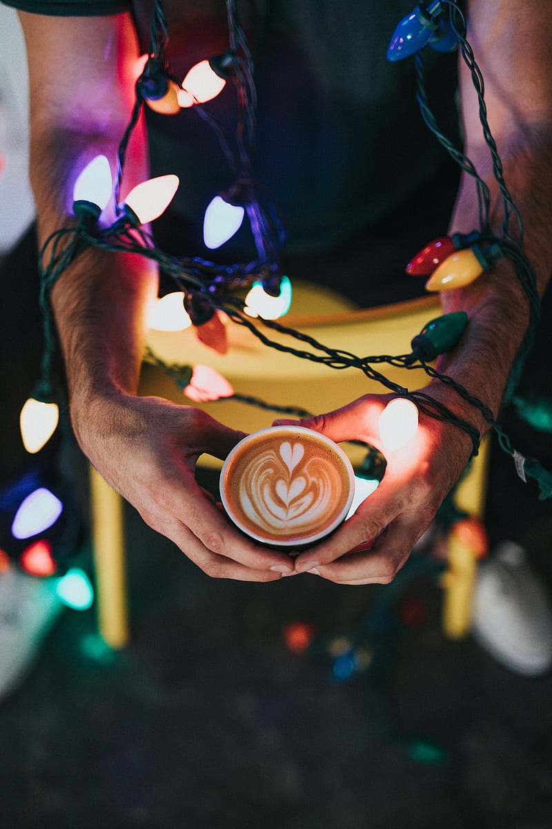 person holding mug with liquor and string light, HD phone wallpaper