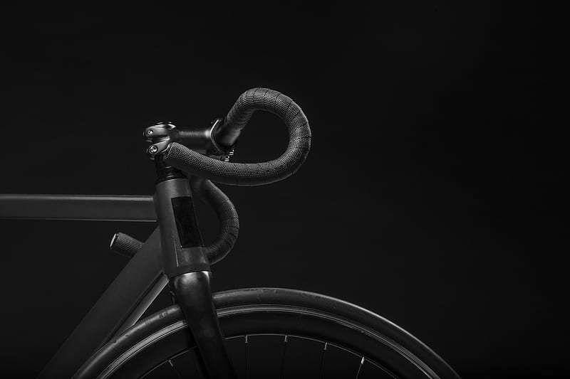black road bicycle handle with black background, HD wallpaper