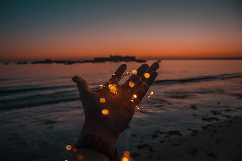 person with string lights on left hand, HD wallpaper
