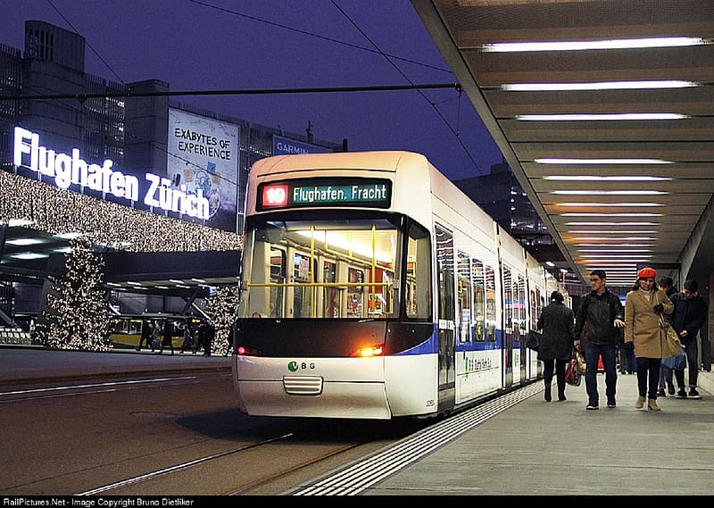 Zurich now operating new trams, whiteand blue line, christmas trees, new tram in new livery, platform, inbedded lightingh on canopy, HD wallpaper