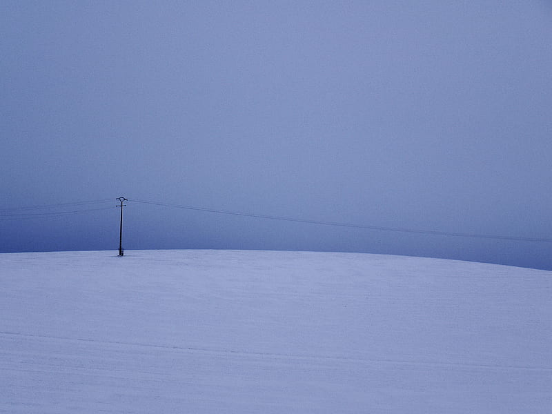 black electric post on snow covered ground under gray sky, HD wallpaper