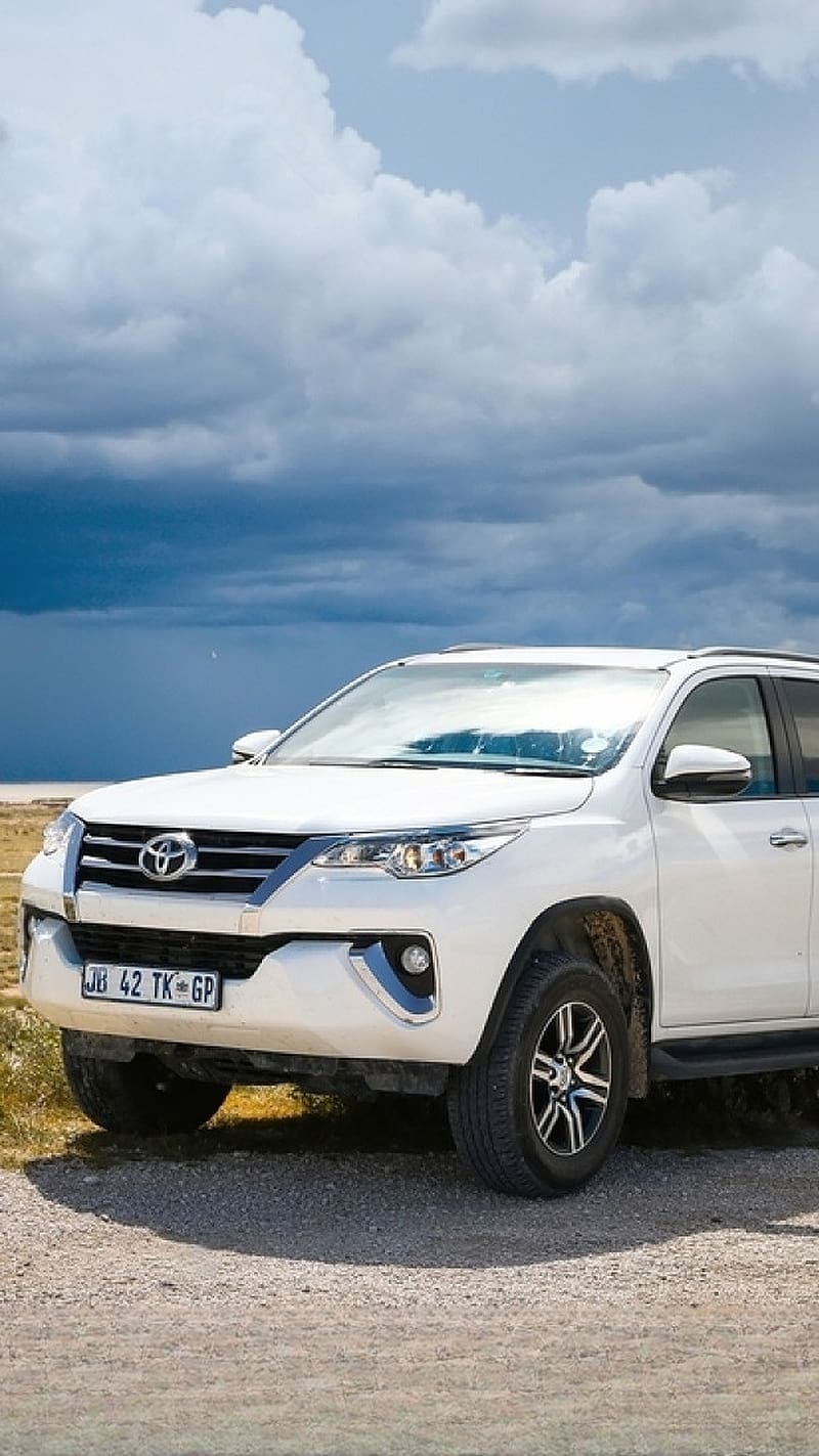 Fortuner Ke, Dark Clouds Background, white car, toyota car, HD phone wallpaper