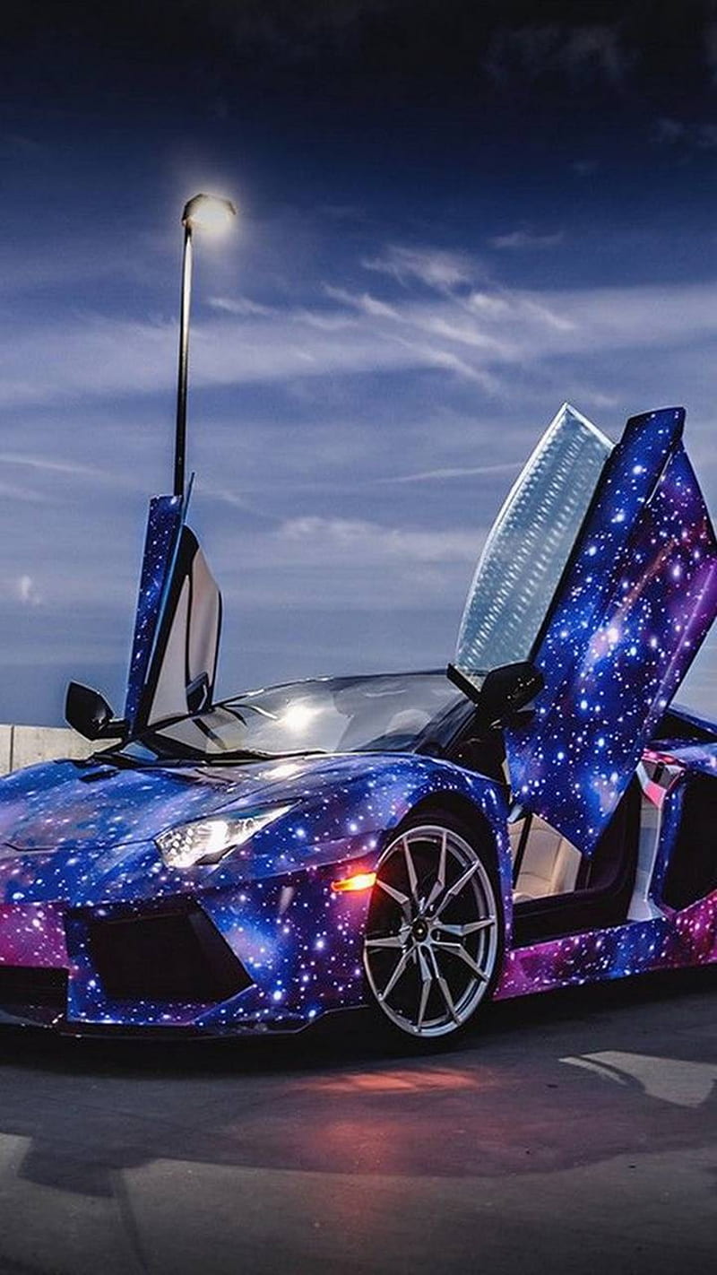 Hãy xem bức ảnh nền Lamborghini Galaxy để trải nghiệm cảm giác chạy xe siêu sang trong không gian bất tận. Đây là một mẫu thiết kế độc đáo và đầy ấn tượng cho phòng làm việc hay ngôi nhà của bạn.