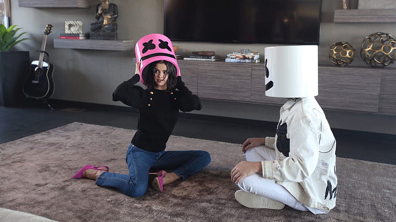 Marshmello Is Sitting On Floor With Selena Gomez Wearing White Dress In TV Stand Background Marshmello, HD wallpaper