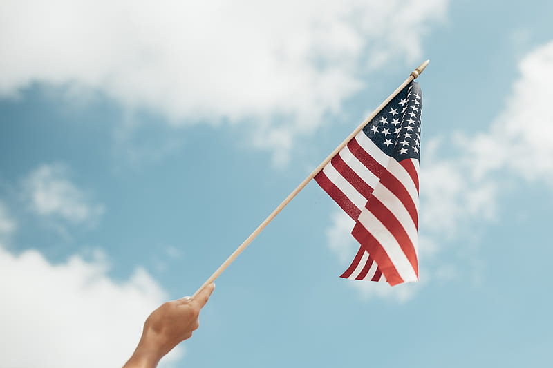 person holding U.S.A. flag, HD wallpaper