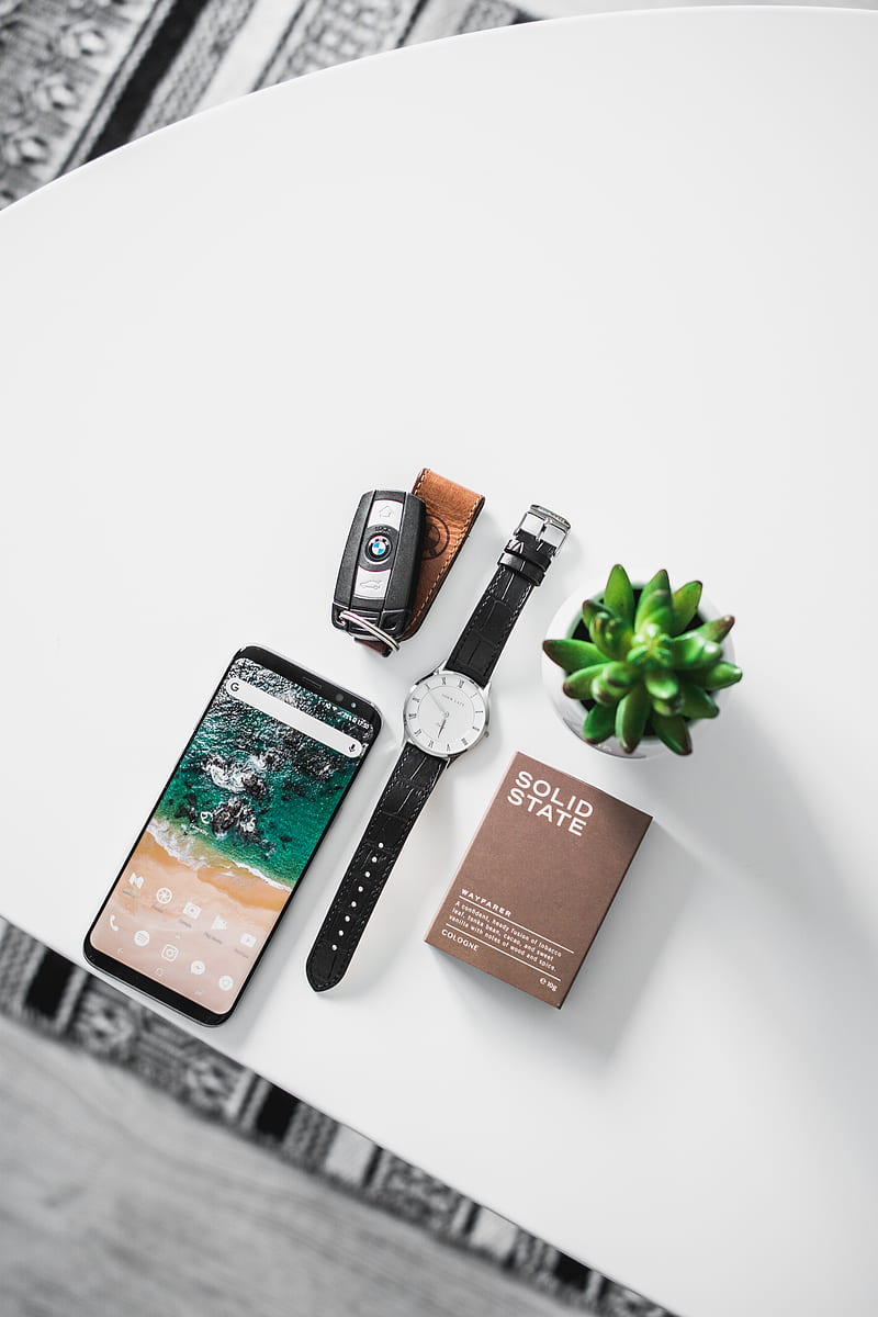 flat lay graphy of watch, smartphone, car fob, and box, HD phone wallpaper