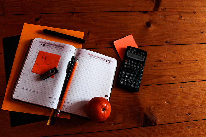 black scientific calculator, orange, and notebook on table, HD wallpaper