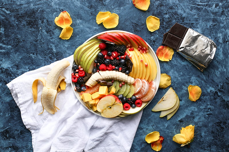 bowl of sliced fruits on white textile, HD wallpaper
