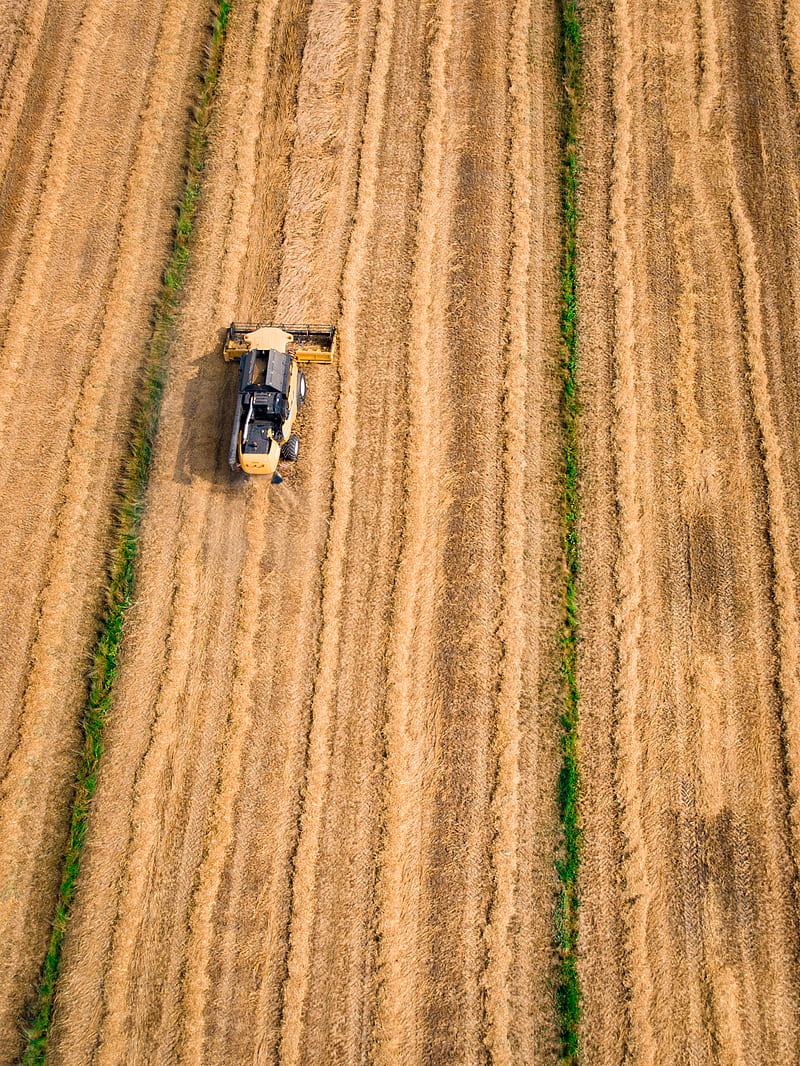 aerial graphy of yellow cultivator on brown field, HD phone wallpaper