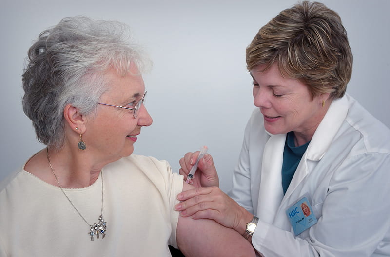 woman inject a woman on left shoulder, HD wallpaper