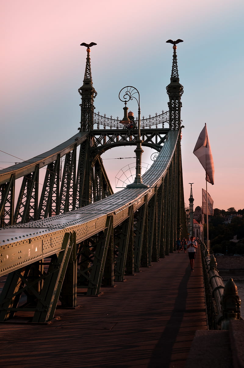 man walking on metal bridge, HD phone wallpaper