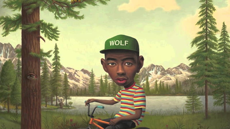 Tyler The Creator Comic Wearing Green Cap And Colorful Striped Tshirt Sitting On Bicycle Music, HD wallpaper