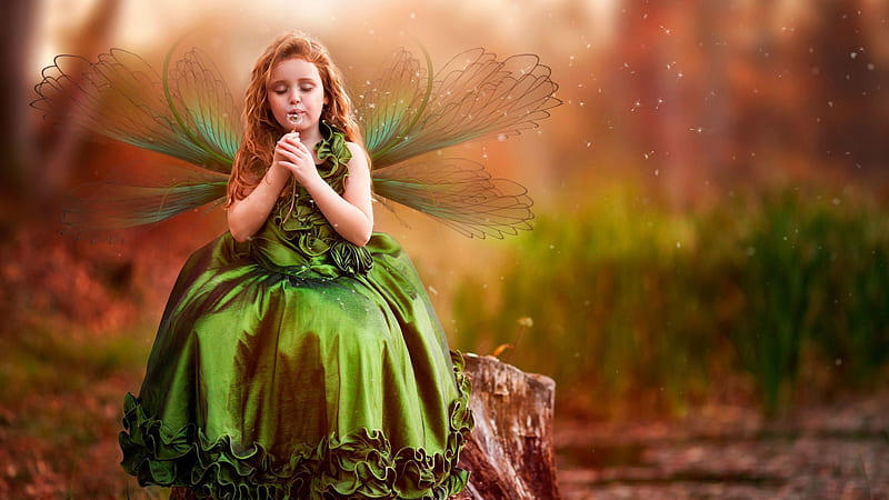 Cute Little Girl With Wings Is Sitting On Tree Trunk Wearing Green Dress In Blur Background Cute, HD wallpaper