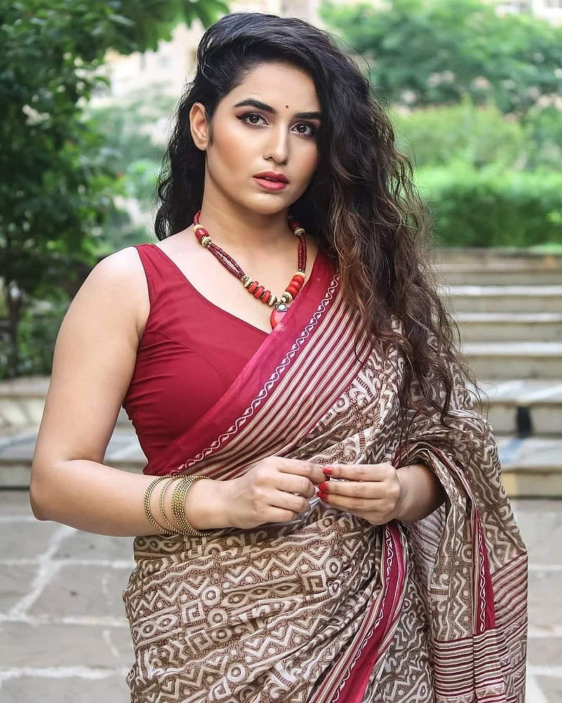 In Photos: Priya Varrier Looks Sizzling In Traditional White Saree As She  Poses Inside Lake