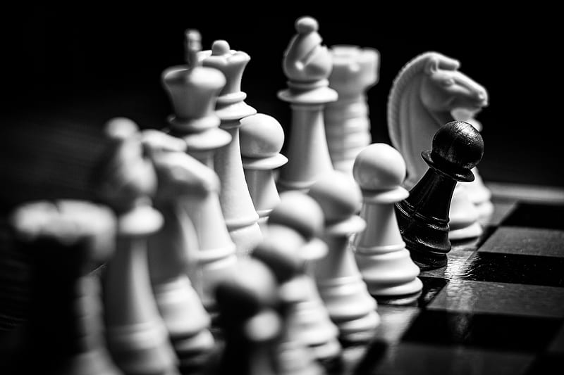 A Game Of Chess With Various Pieces And A Black And White Chess Board  Background, Game, Table Setting, Chess Background Image And Wallpaper for  Free Download