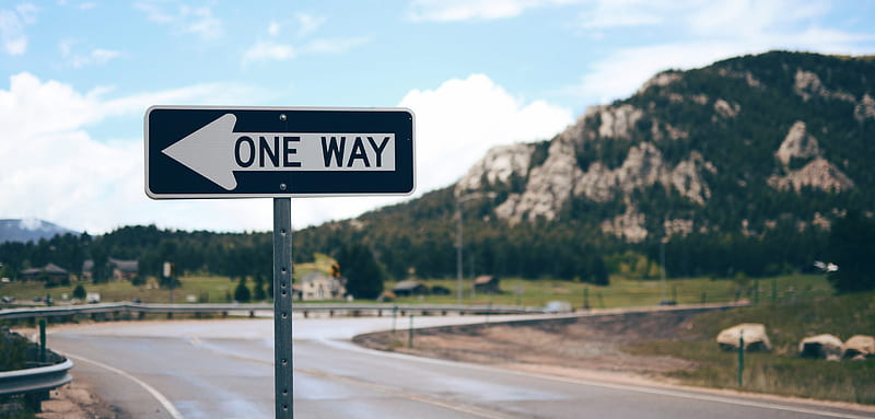 One Way street sign beside road far at the mountain during daytime, HD wallpaper