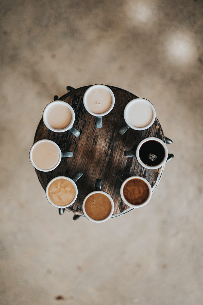 flat lay graphy of eight coffee latte in mugs on round table, HD phone wallpaper