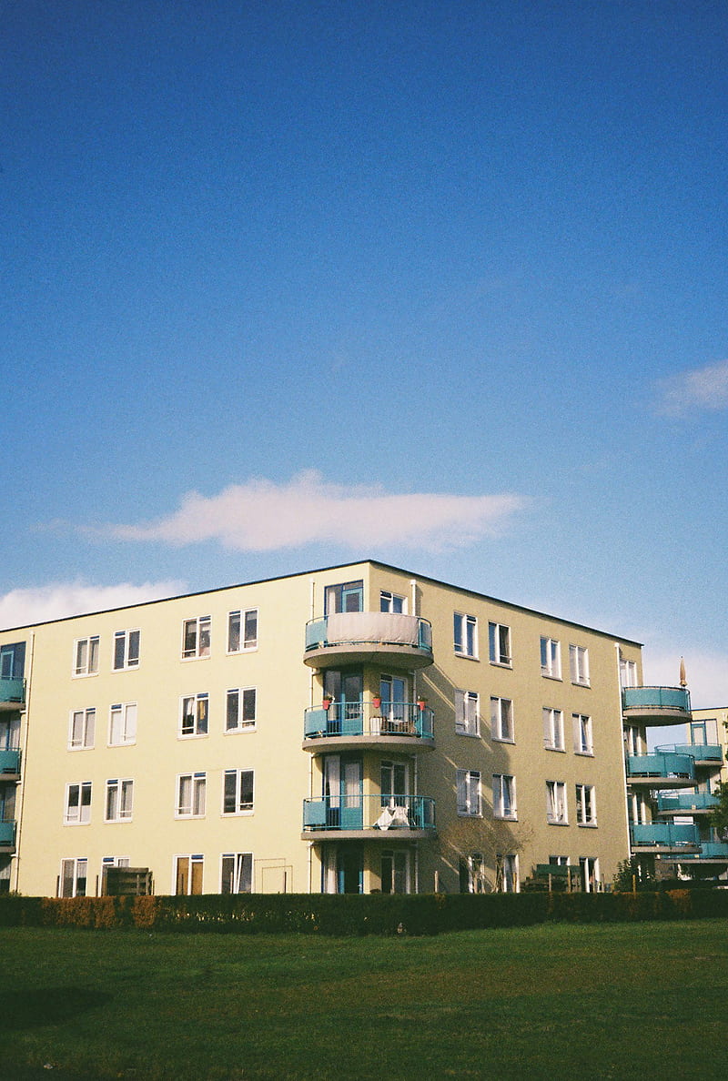 beige concrete building under blue sky during daytime, HD phone wallpaper