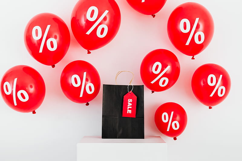 A Black Paper Bag With Sale Tag in the Middle of Red Balloons With Percentage Symbols on White Background, HD wallpaper