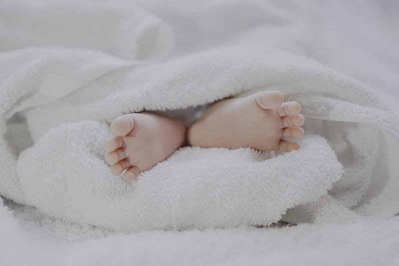 barefooted baby covering white blanket, HD wallpaper
