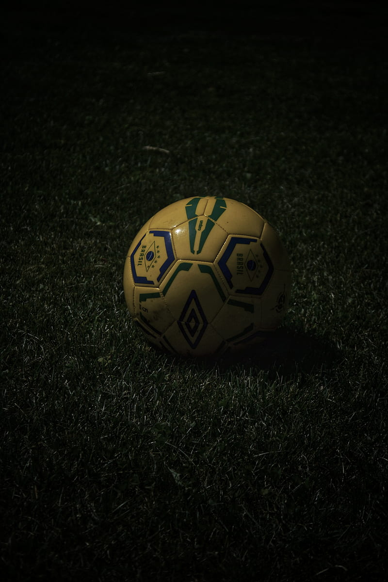 yellow and black soccer ball on green grass, HD phone wallpaper