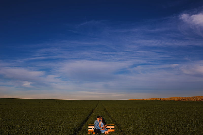 two man and woman sitting on bench on grass field, HD wallpaper