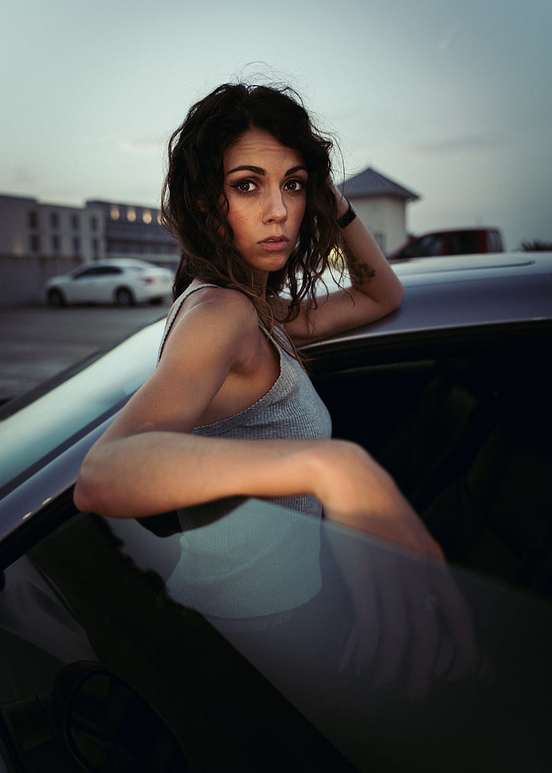 woman in gray tank top sitting on car hood during daytime, HD phone wallpaper