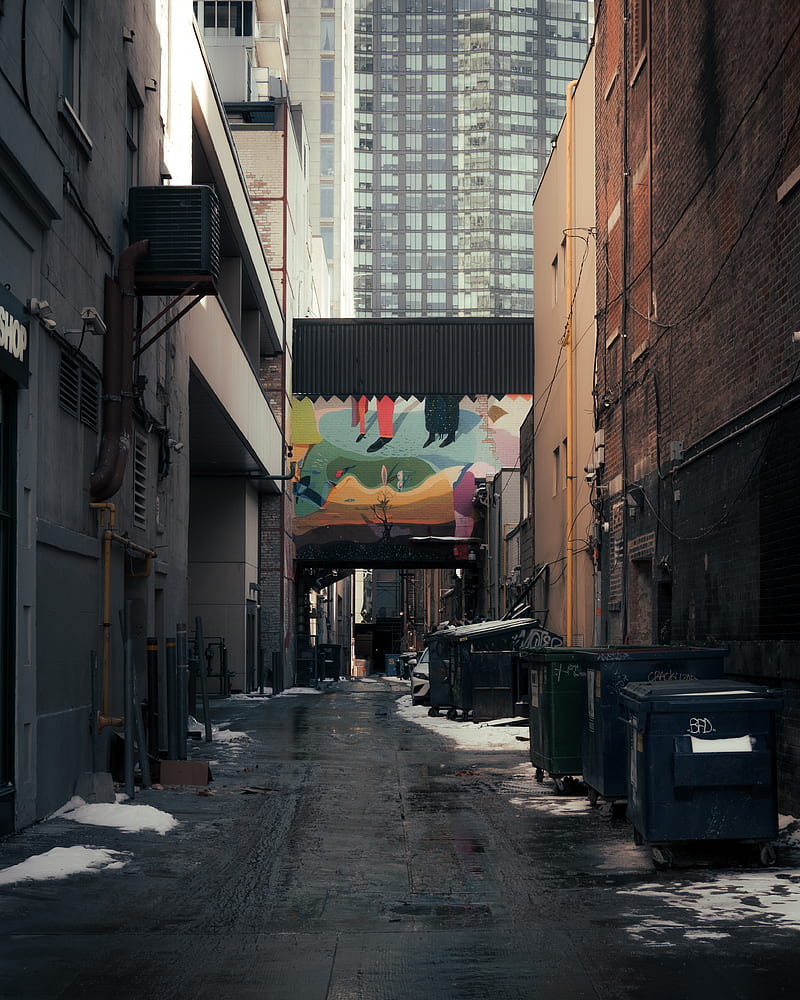 black trash bin beside brown concrete building during daytime, HD phone wallpaper