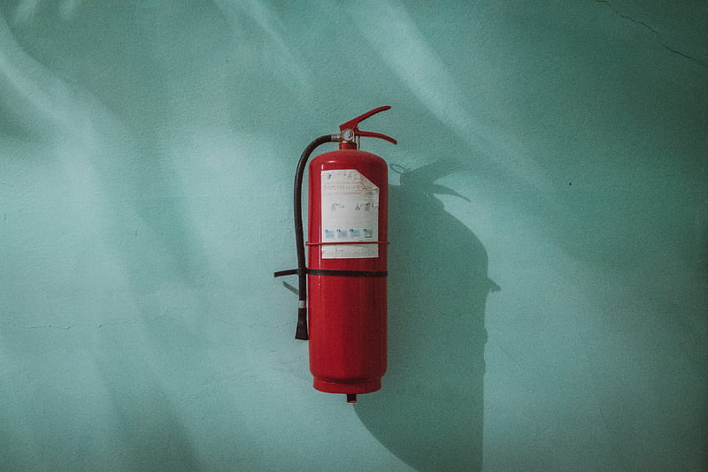 red fire extinguisher on green wall, HD wallpaper