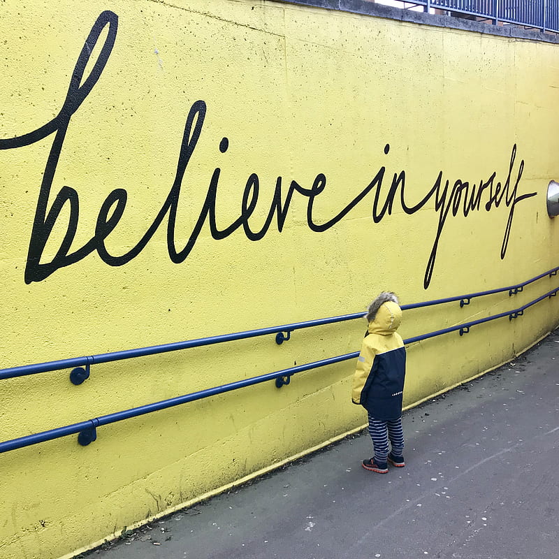 toddler looking at believe in yourself graffiti, HD phone wallpaper