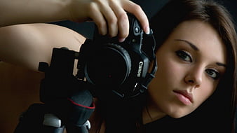 girl photographer with canon