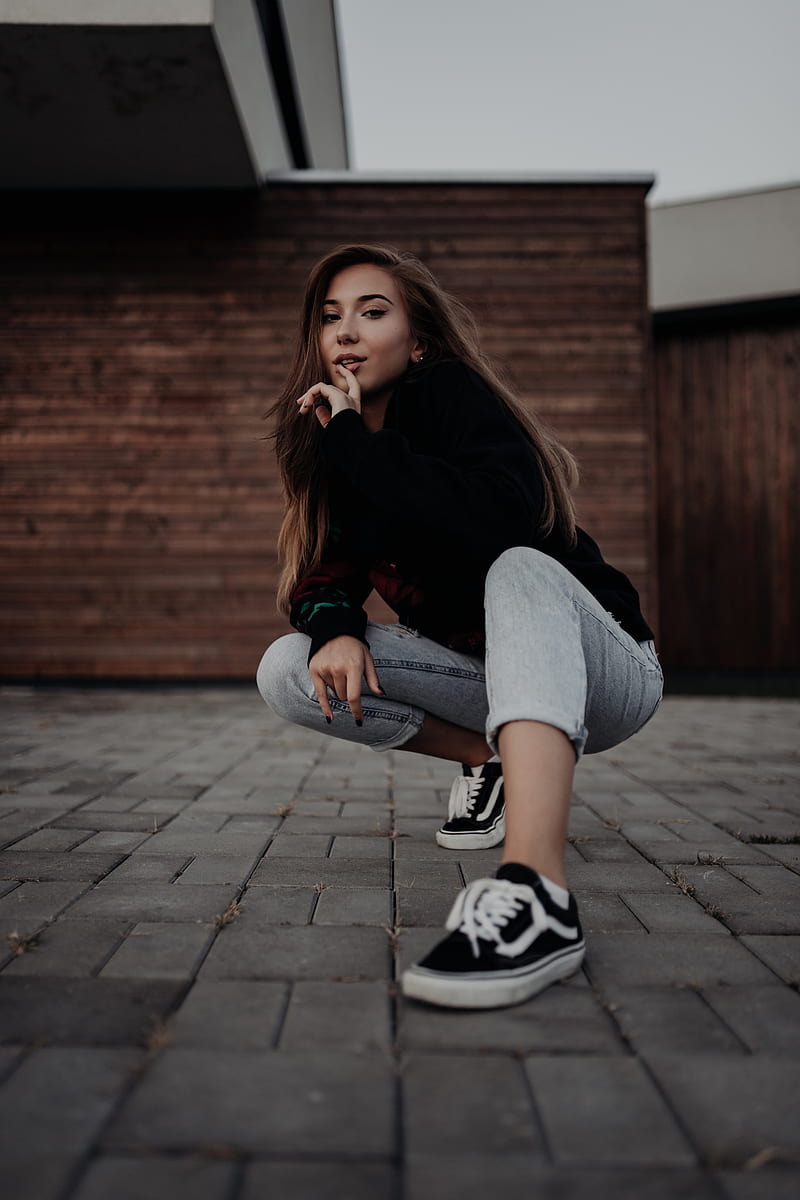 women, long hair, women outdoors, brunette, urban, squatting, jeans, painted nails, sneakers, looking at viewer, finger on lips, HD phone wallpaper