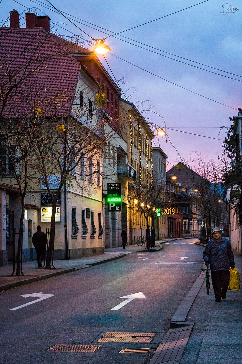 people walking on sidewalk near building during night time, HD phone wallpaper
