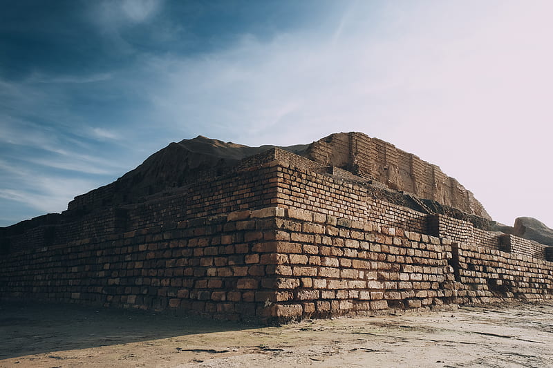 Brown brick wall near mountain under blue sky during daytime, HD