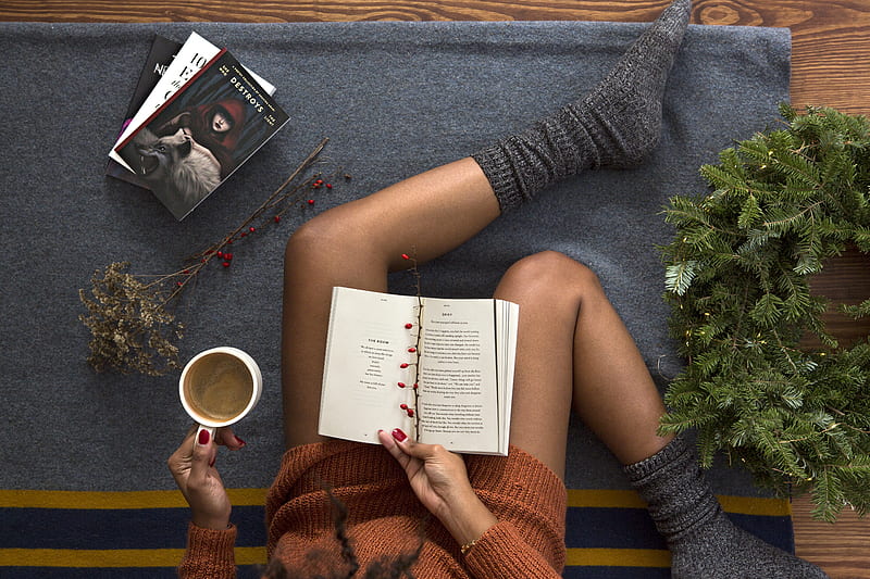 opened book on person's lap with gray socks, HD wallpaper