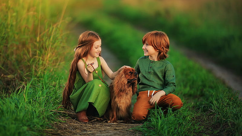 Cute Little Boy And Girl With Dog Are Sitting On Green Grass Wearing Green Dress In Blur Green Background Cute, HD wallpaper